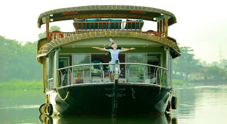 An Inland Marine houseboat moored at dusk